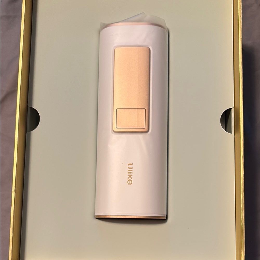 Ulike White and Gold Device